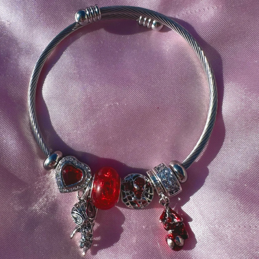 Pulsera con dijes de plata de ley 925
